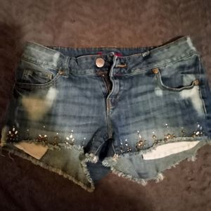 Distressed jeweled shorts for summer